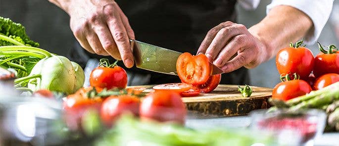 Chef chopping vegetables