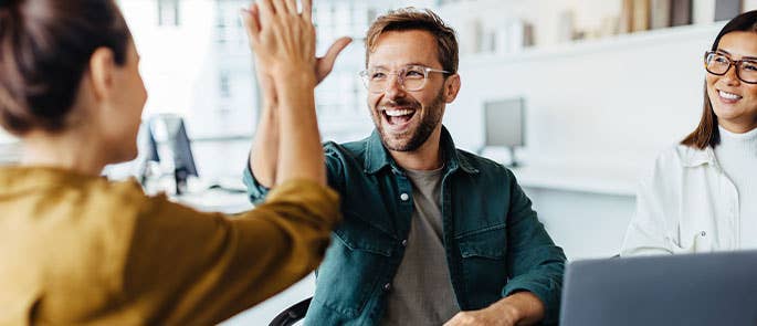 happy employees due to soft skills in the workplace