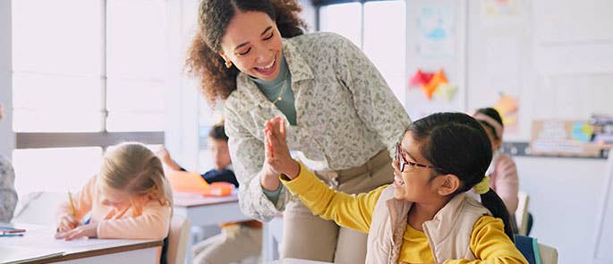 teaching assistant supporting a student